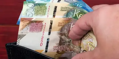Wallet and money representing startup cash reserves in Kenya – Zidika Consulting