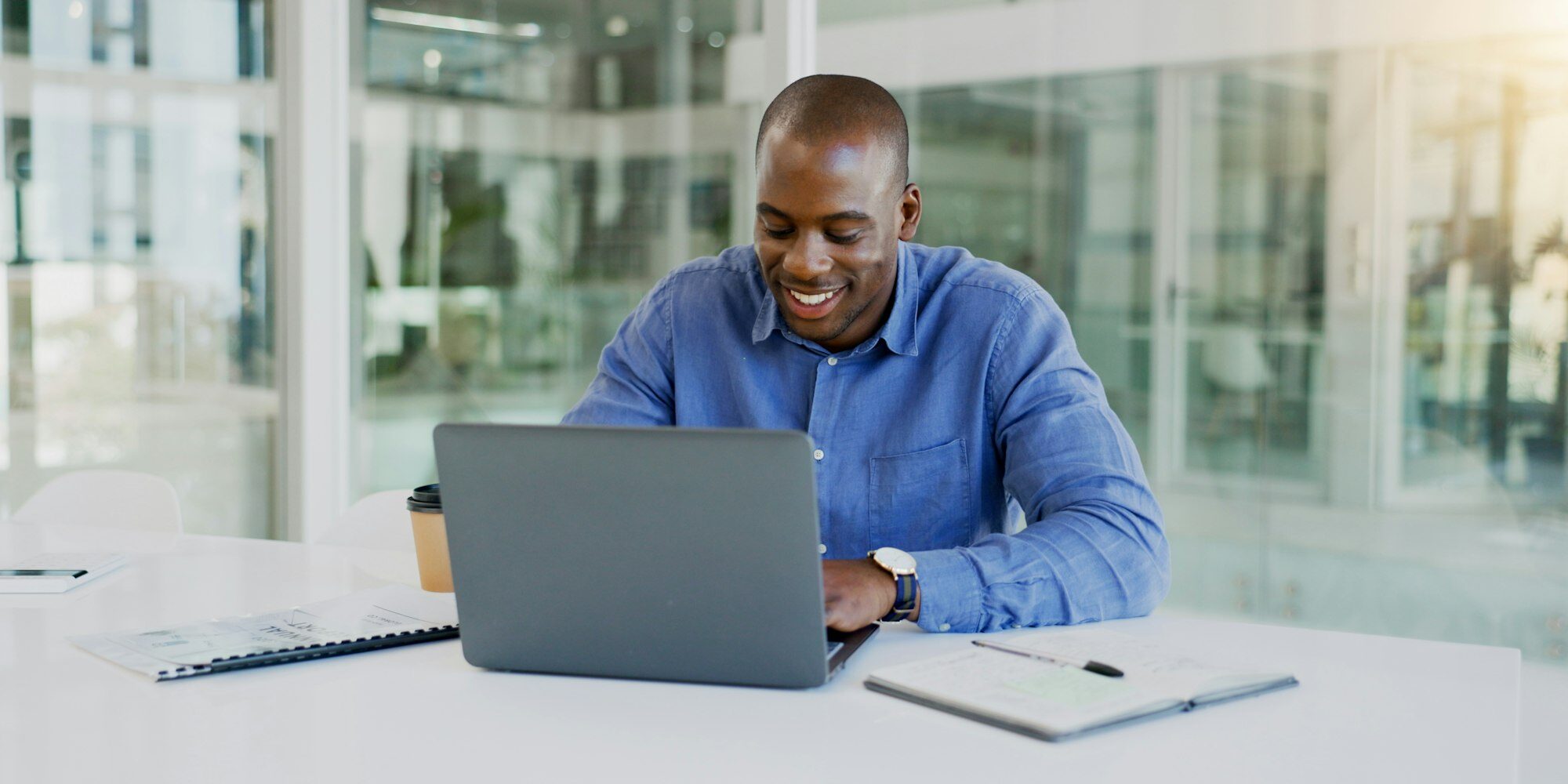 Business man, laptop and happy in office for finance, budget report and revenue proposal, taxes rev