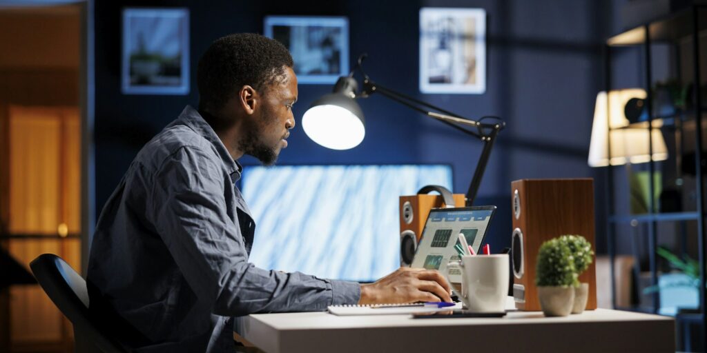 Startup owner working late on cash flow planning – Nairobi, Kenya – Zidika Consulting